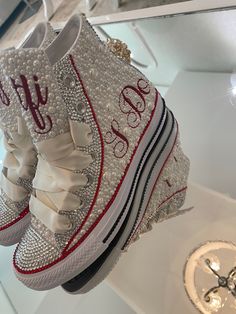 These beautiful sneakers are handmade to order with hand placed pearls and rhinestone crystals of the highest quality.  Order for a wedding party or bride. These shoes are fully customizable with your choice of color crystals or text. Each pair comes with a small repair kit and a pair of satin laces. PLEASE FOLLOW THESE STEPS TO ENSURE THAT YOUR SHOES ARE EXACTLY HOW YOU ORDER. I provide the classic All-Star unisex Converse sneaker. Note these sneakers run big and I highly recommend you try on the shoe in your local area if you are not sure of the fit.  All orders are custom and non-returnable/refundable.  Please note this is a custom items and will take 4-6 weeks for delivery. Sneaker Ball Wedding, White Custom Sneakers With Rhinestones For Wedding, Wedding Custom Sneakers With Rhinestones And Round Toe, Custom Wedding Sneakers With Rhinestones, Sneakers For Wedding, Wedding Converse Shoes, Wedding Tennis Shoes, Nye 2024, Bride Sneakers