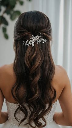 a woman wearing a bridal hair comb