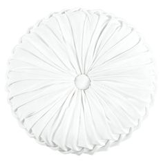 a white round pillow with pleated edges on a white background, viewed from above