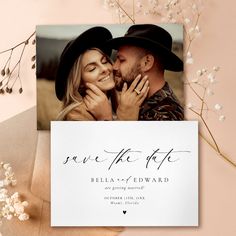 a wedding save the date card with an image of a couple kissing and holding each other