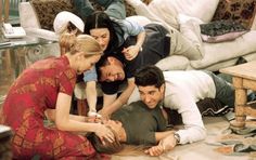 a group of people laying on the floor together