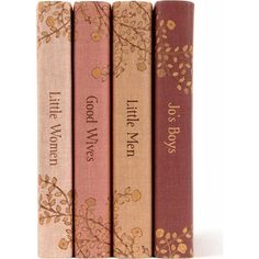 four books are lined up next to each other on a white surface with gold lettering