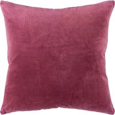 a pink velvet pillow on a white background