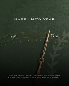 a happy new year card with a clock and a pair of scissors in front of it