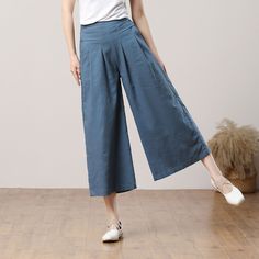 "Cool and comfortable for hot summer days, this blue wide leg pants is elegant and stylish.    It is a wonderful wardrobe staple that's a timeless classic you'll wear again and again.  All our items are Tailored and Handmade and Made to Order ,I can make Any Size . I design new styles every week, please collect my store. I believe that you will meet your favorite styles. ★★FEATURES 100% cotton Two side pockets Back elastic waist Wide leg pants Blue pants Casual pants Long pants Loose pants Plus Versatile Baggy Wide Leg Pants For Spring, Summer Wide Leg Relaxed Fit Capris, Wide Leg Relaxed Fit Summer Capris, Wide Leg Relaxed Fit Capris For Summer, Versatile Wide Leg Spring Capris, Relaxed Fit Wide-leg Summer Capris, Versatile Blue Relaxed Fit Wide Leg Pants, Casual Blue Wide Leg Harem Pants, Spring Wide Leg Solid Color Bottoms