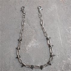 Spiked Wallet Chain A spiked chain link belt with clasps at each end, which can be worn as a wallet chain or a necklace. Length: 25.2"/64cm. Material: Stainless Steel/Alloy. Chain For Pants, Pant Chains, Estilo Punk, Style Punk, Waist Chain, Chain Belt, Punk Style, Wallet Chain, Chains For Men