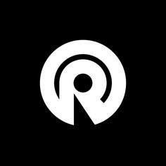 the letter q in a black and white circle with an arrow at the center, on a dark background