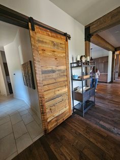 custom barnwood barn door on flat track barndoor hardware Two Panel Doors, Reclaimed Wood Floors, Sliding Wood Doors, Solid Door, Wood Barn Door, Barn Door Track, Wood Barn, Sliding Door Handles, Reclaimed Lumber