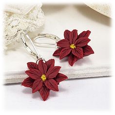 Hand sculpted Red Poinsettia earrings.  Flower are approximately 1.5cm. Choose from assorted kidney or leverback earwires or titanium (hypoallergenic) short hooks..   The Poinsettia is December's birth flower and makes a great gift for those with a December birthday. -Original hand sculpted polymer clay flowers -Durable, water-resistant -No molds, no paint, no glue -Assorted earwires to choose from -Titanium (hypoallergenic) option available -Flower size : 1.5cm -Lightweight earrings View matching collection at:  https://www.etsy.com/shop/strandedtreasures/search?search_query=poinsettia This item is made-to-order. Listing photos are for example. COLOR SAMPLE CARDS Require a color match? Colors may appear slightly different on screen than in person. If you require a color match, purchasing Poinsettia Jewelry, Red Christmas Flower, Poinsettia Earrings, December Birth Flower, Red Poinsettia, December Birthday, Match Colors, Gold Bond, Flower Gifts