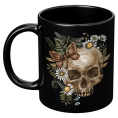 Embrace the beauty of the natural world with the Return to Nature 11 oz Ceramic Mug. This glossy black mug features enchanting artwork depicting a skull surrounded by flowers, ferns, and a moth. Perfect for your favorite beverages, it adds a touch of nature-inspired elegance to your drinkware collection. Key Features: High Gloss + Premium Black Finish: Ensures a sleek, stylish look. ORCA Coating: Provides durability and a high-quality finish. Dishwasher and Microwave Safe: Easy to clean and conv Return To Nature, Surrounded By Flowers, Candle Wax Melts, A Skull, White Coffee Mugs, Black Mug, White Coffee, Event Calendar, Black Ceramic