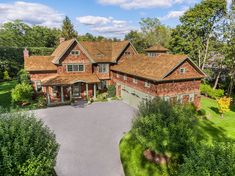 an aerial view of a large brick house