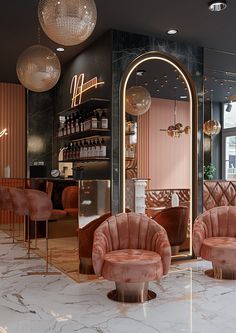 the interior of a restaurant with pink velvet chairs and marble floors, chandeliers hanging from the ceiling