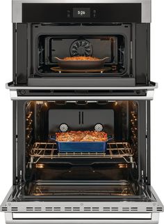 two ovens side by side with food cooking in the bottom and one on the top