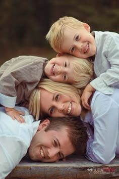 the family is posing for a photo together