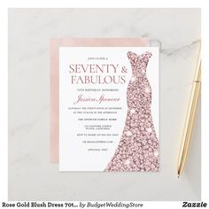 a pink and black bridalette wedding card on a marble table with flowers in the background