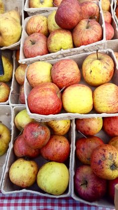 apples and pears for sale at an outdoor market