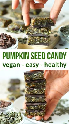 pumpkin seed candy is stacked on top of each other and being held by two hands