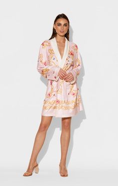 Gold, ornate filigree make a lovely resting place for a kaleidoscope of Butterflies and flowers in this blush pink short robe. The flattering and floral short robe is constructed from ultra-soft microfiber for that all day luxe vibe. One size Short bath/lounge Robe Shawl collar 2 bottom side pockets Sewn in belt Made of soft and absorbent microfiber Machine wash cool Tumble-dry low Lavender Design, Lounge Robes, Butterflies And Flowers, Resting Place, Pool Beach, Quiet Moments, Floral Short, Pink Butterfly, Pink Shorts