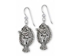 Our Flounder Earrings weighs approximately 8.72 grams in sterling silver. This design measures approximately 1 inch high. These Flounder Earrings are an original Esquivel and Fees jewlery design. Our Flounder Earrings are hand cast, using the lost wax casting process and are hand finished When you place your order. Please allow extra time while we make these for you. This Flounder design is hand cast in .925 sterling silver. Our handmade Flounder Earrings are perfectly detailed. We offer hypoall Flounder Jewelry, Fish Earrings, Fish Jewelry, Silver Fish, Wax Casting, Lost Wax Casting, Jewelry Sterling Silver, Lost Wax, Hand Cast