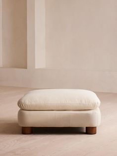 Inspired by our members' favorite Vivienne sofa on the eighth floor of White City House, this ottoman has been upholstered in natural linen with cylindrical legs. Designed to work with our Vivienne sofa and Vivienne modular sofa, it can be used as an additional seating spot or for putting your feet up. Soho Home Vivienne Ottoman, Linen, Bisque, Us | White Linen Ottoman, Ottoman Upholstered, Leather Footstool, Soho Home, Square Ottoman, The Vivienne, Ottoman Footstool, White City, Soho House