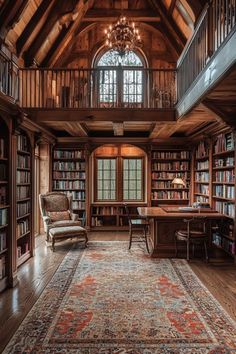 a large room with lots of bookshelves and a rug on the floor in front of it