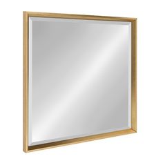 a wooden framed mirror on a white wall with light wood trimming and a gold frame