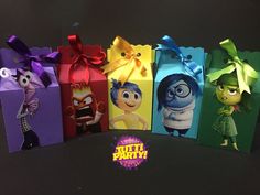 there are six small gift bags with cartoon characters on them, each decorated in different colors