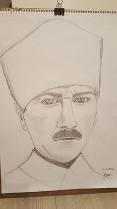 a drawing of a man with a hat on top of his head and one eye open