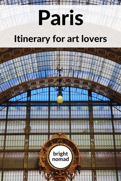 the inside of a train station with an overhead sign that reads paris itinerary for art lovers