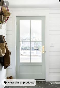 the entryway is clean and ready for us to use as a place for shoes