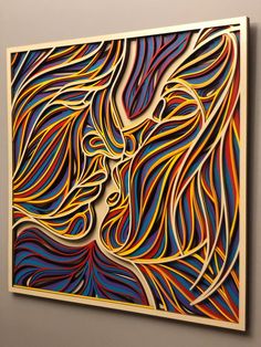 an abstract painting with multicolored lines on the side of it and a woman's face in the middle