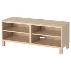 a wooden shelf with two shelves on each side