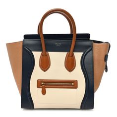 This is an authentic CELINE Elephant Calfskin Mini Tri-Color Luggage in Brown. This stylish tote is crafted of luxuriously smooth calfskin leather in beige and black with grained calfskin in brown. The bag features light brown rolled leather top handles and a decorative signature Celine scroll trim and expansive sides. The top overextended zipper opens to a spacious leather interior with a zipper and patch pockets. Feature Light, Leather Interior, Leather Top, Light Brown, Tri Color, Patch Pocket, Calf Skin, Zipper, Elephant