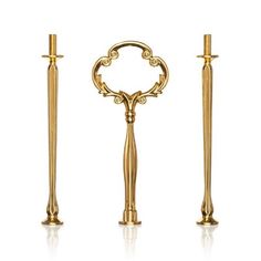 three golden candlesticks and one candle holder