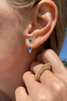 A classic ear jacket. The paraiba cz cluster stud is worn in the ear, with cluster underneath the lobe, a great everyday earring with a twist Droplet Earrings, Ear Jacket Earring, Ear Jacket, Right Hand Rings, Pink Topaz, Gemstone Stud Earrings, Jewelry Essentials, Turquoise Rings, Gemstone Studs