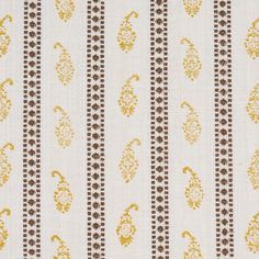 a white and brown striped wallpaper with small gold designs on the bottom half of it