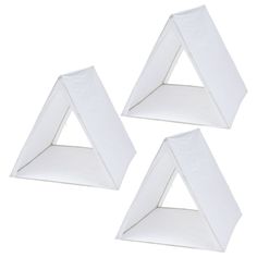 three pieces of white paper sitting on top of each other