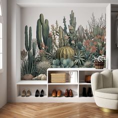 a living room with a cactus mural on the wall and wooden flooring in front of it