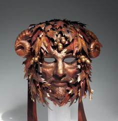 Autumnal Silvanus Mask - MADE-TO-ORDER/Out-of-Stock OUT-OF-STOCK/MADE-TO-ORDER: Please message me before purchasing this mask. Let me recreated it and send photos before you buy so you can see exactly what you're getting (it's not possible to reproduce a new mask that's exactly identical to the one pictured). When you convo me, I'll let you know my current lead time and place you in the commissions queue, then contact you when I start the mask to confirm you are still interested. Please be prepa Masquerade Outfit, Paper Mache Mask, Devil Mask, Theatre Masks, Fantasy Props, Cool Masks, Masks Art, Painted Leaves, Masquerade Ball