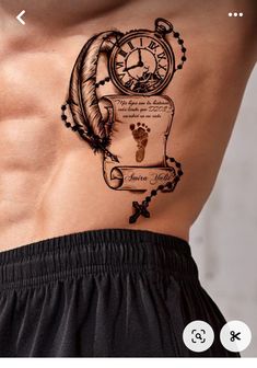 a man's stomach with a tattoo on it that has a clock and feather