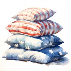 three pillows stacked on top of each other with the colors of the american flag painted on them