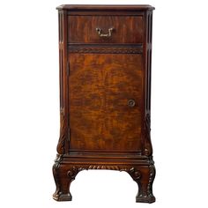 an antique wooden cabinet with drawers and handles on the front, against a white background