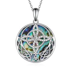 a pendant with an intricate design in the center