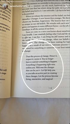 an open book with a circle in the middle