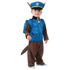 a little boy dressed up in a costume