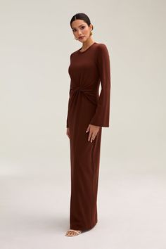 Step into elegance with our Aissia Ribbed Twist Front Maxi Dress. The ribbed fabric and twist front create an elegant design that can be dressed up or down. Perfectly versatile, this dress pairs beautifully with an abaya for a luxurious and sophisticated look. Model is 5'7 wearing size S/58" White Dress Formal, Dresses Flowy, Nikkah Dress, Sophisticated Look, Engagement Dresses, Dress Satin, Kids Outerwear, Ribbed Dresses, Basic Dress