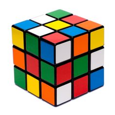 a colorful rubik cube sitting on top of a white table