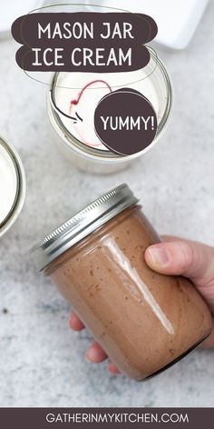 a person holding a mason jar with ice cream in it and the words, mason jar yummy