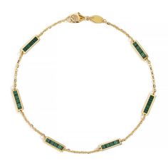 Semi-Precious Malachite Bars adorn a minimal 14K Solid Yellow Gold chain. The perfect gift for May birthdays 14K Solid Gold Malachite Semi-precious stone Hypoallergenic, lead and nickel free Chain Thickness 1mm Bar Accents 9mm x 3mm Chain Length: 6in (15.2cm), 6.5in (16.5cm), 7in (17.8cm) Chain Lengths under 7 inches will have 5 bar accents #BS080 gemstone-bar-bracelet-lapis-lazuli-14k-gold gemstone-bar-bracelet-onyx-14k-gold gemstone-bar-bracelet-malachite-14k-gold gemstone-bar-bracelet-rose-qu Bracelet Malachite, May Birthdays, Gold Arm Band, Solid Gold Bracelet, Bar Bracelet, Gold Armband, Bar Bracelets, Yellow Gold Chain, Solid Yellow