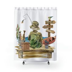 a shower curtain with a painting of a man fishing